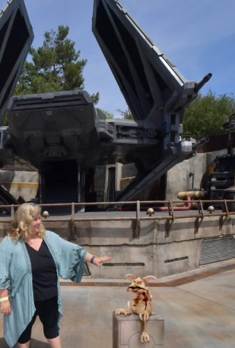 Author Elizabeth Van Tassel with creature and on the set of Galaxy's Edge