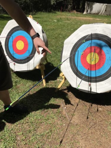 Joey's arrow pointed by a hand by target